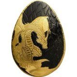 Монета в форме яйца с изображением дракона